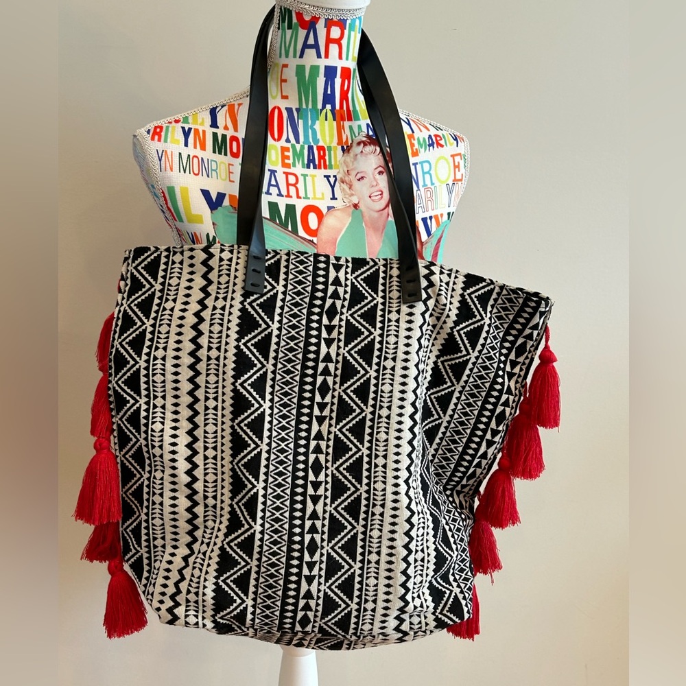 Black and White Patterned Tote Bag with Red Tassels. Great condition.